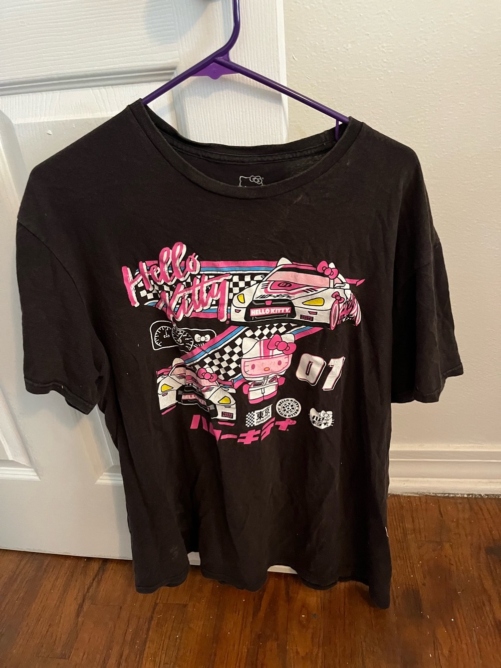 Hello Kitty Black Tee with Pink Racing Graphic